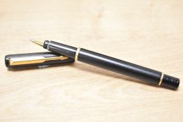 A Parker 88 Rialto roller ball pen in laque black. Slightly chewed