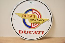 A round painted cast Ducati Mechanica Bolognia wall plaque 24cm
