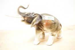 A Royal Dux bone china elephant study, bearing stamp '378 and 927' to underside but no pink