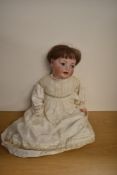 Schoenau & Hoffmeister Hanna 9 Bisque Headed Doll, sleep blue eyes, brown painted eyebrows, open