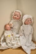 Armand Marseille Bisque Headed Dolls, sleep blue eyes, open mouths with two teeth showing,