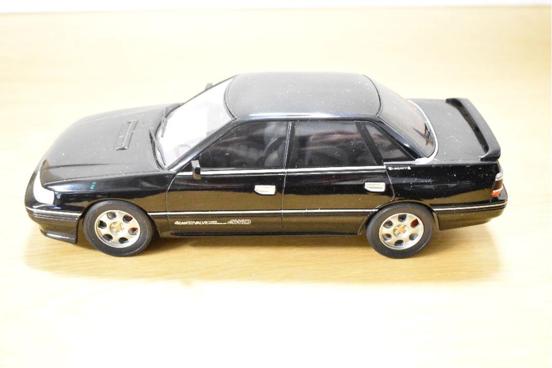IXO 1:18 Scale Die-cast, 18CMC131A.22 Subura Legacy RS1991 Black, boxed with internal packaging - Image 2 of 4