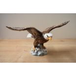 A Beswick Pottery 'Bald Eagle' study model number 1018 designed by Arthur Gredington in brown and