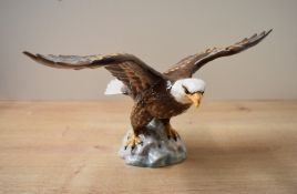 A Beswick Pottery 'Bald Eagle' study model number 1018 designed by Arthur Gredington in brown and
