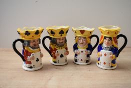 A group of four limited edition Royal Doulton bone china dual-faced character jugs comprising King
