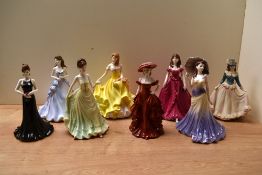 A Royal Doulton bone china figurine 'Summer' HN 5322 sold together with a group of seven Coalport