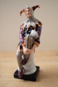 A Royal Doulton bone china figure 'The Jester' HN 2016, measures 25cm tall.