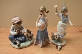 A group of three Lladro porcelain figures/figurines comprising 'I Hope She Does' model number