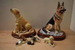 A group of five Border Fine Arts dog studies to include 'Friends' model number JH75 designed by Anne