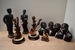 A group of six pottery African American jazz band studies including saxophone, vocals and guitar,