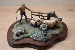 A limited edition Border Fine Arts group 'One Man and His Dog' model number L55 by Ray Ayres,