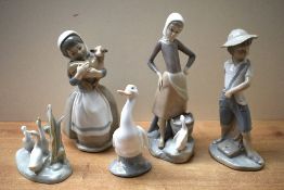 A group of six Lladro and Nao by Lladro porcelain studies to include 'Girl with milk pail and goose'