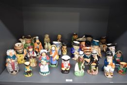 A large assortment of Royal Kirkham and similar pottery Toby character jugs to include Beggar,