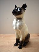 A large Beswick Pottery Siamese Cat (Seated, Head up) model number 2139 designed by Mr Garbet in