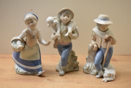 A group of three Rex Valencia figures/figurines, in the style of Lladro porcelain, comprising 'Boy