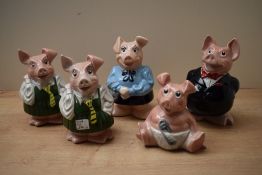 A group of six Wade for Natwest ceramic piggy banks, comprising the complete set of five 'Sir