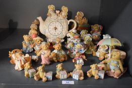 A large assortment of Cherish Teddies studies to include 'Frank & Helen', 'Cradled with Love' and '