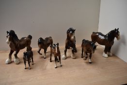A group of seven Beswick Pottery horse studies to include 'Cantering Shire' model number 975