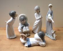 A group of five Lladro and similar porcelain figurines to include 'Girl with Goose' model number