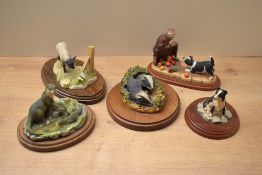 A group of five Border Fine Arts animal groups to include 'Jess' model number JH20 designed by Ray