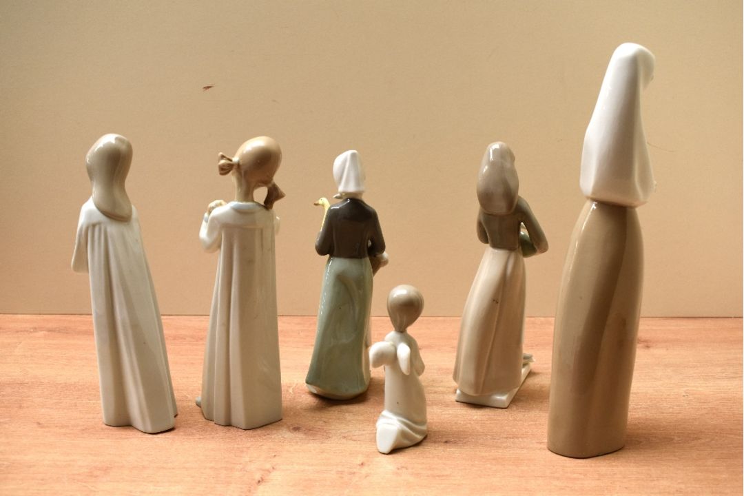 A group of six Nao by Lladro and similar porcelain figurines to include 'Girl Stretching' and ' - Image 2 of 4