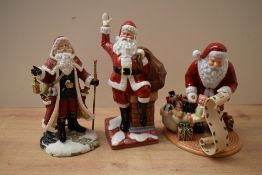 Two Royal Doulton bone china figures comprising 'Santa Claus' HN 4175, 'Santa's List' HN 4801 sold