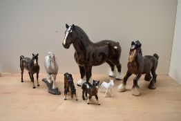 A group of seven Beswick Pottery and similar horse studies to include 'Cantering Shire' model number