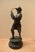 A large 20th century patinated metal study depicting a medieval knight in a defensive stance,