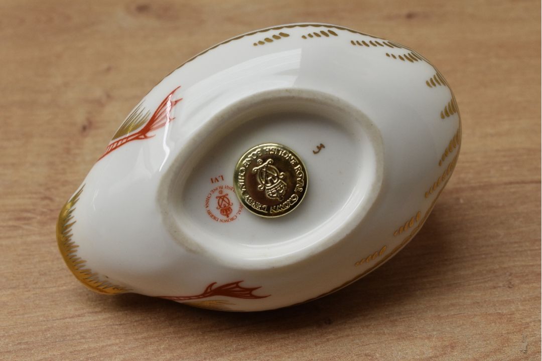 A Royal Crown Derby bone china duck paperweight, having Imari style decoration and a gold coloured - Image 3 of 3
