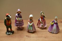 A group of four Royal Doulton bone china figurines comprising 'Tootles' HN 1680, 'Greta' HN 1485, '