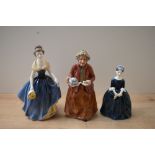 A group of three Royal Doulton bone china figurines comprising 'Teatime' HN 2255, 'Cherie' HN 2341