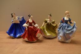 A group of four Royal Doulton bone china figurines comprising 'Stephanie' HN 2811, 'Elizabeth' HN