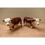 Two Coopercraft pottery Hereford cattle studies, comprising bull and cow, both in brown and white