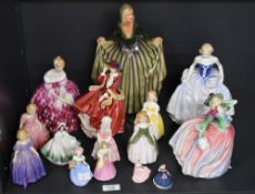 A large group of Royal Doulton and similar figurines to include 'Autumn Breezes' HN 1911, Figurine