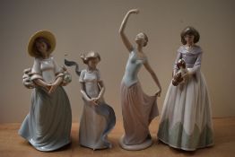A group of four Nao by Lladro porcelain figurines comprising 'The Dance' model number 1204, 'Spoiled