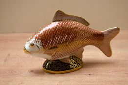 A Royal Crown Derby 'Golden Carp' paperweight, featuring Imari style decoration and no coloured
