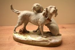 A Kunst porcelain, in the manner of Royal Dux, animal group, depicting a pair of setters, one