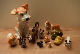 A group of eleven Sylvac and similar pottery dog studies to include 'Pekingese' model number 3755