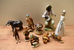 A miscellaneous selection of figures and studies to include a Beswick Pottery 'Elephant' (Trunk