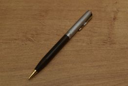 A Parker Vacumatic rotary pencil in Navy Grey with Sterling Silver engine turned lined cap with Gold