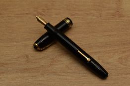 A Conway Stewart 58 lever fill fountain pen in Black with one broad and two narrow cap bands