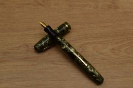 A Wahl Oxford lever fill fountain pen in Green Marble with single cap band having a Wahl 3 14k 0.585