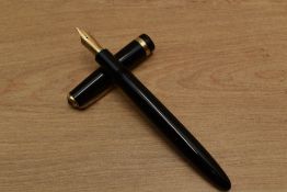 A Parker Duofold Maxima aerometric fill fountain pen in Black with decorative cap band having 14K