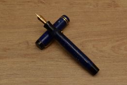 A Parker Duofold Junior streamlined button fill fountain pen in Lapis Lazuli with two cap bands