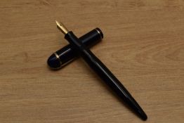 A Wahl Eversharp Skyline lever fill fountain pen in Dark Blue with single cap band having