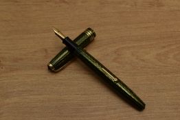 A Conway Stewart Conway 93 lever fill fountain pen in Green Chevron pattern with two narrow and