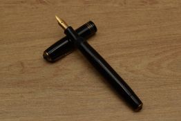 A Parker Vacumatic Junior fountain pen in Black with three cap bands having Parker Vacumatic Made in