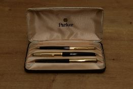 A boxed Parker 61 Custom Insignia capillary fill fountain pen, ballpoint pen and pencil set in Black