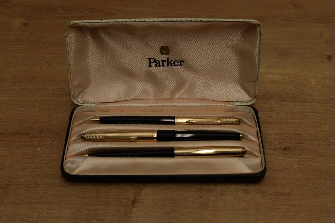 A boxed Parker 61 Custom Insignia capillary fill fountain pen, ballpoint pen and pencil set in Black - Image 1 of 3