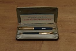 A boxed Parker 51 aerometric fill fountain pen in Teal with Rolled Gold converging line cap. Circa